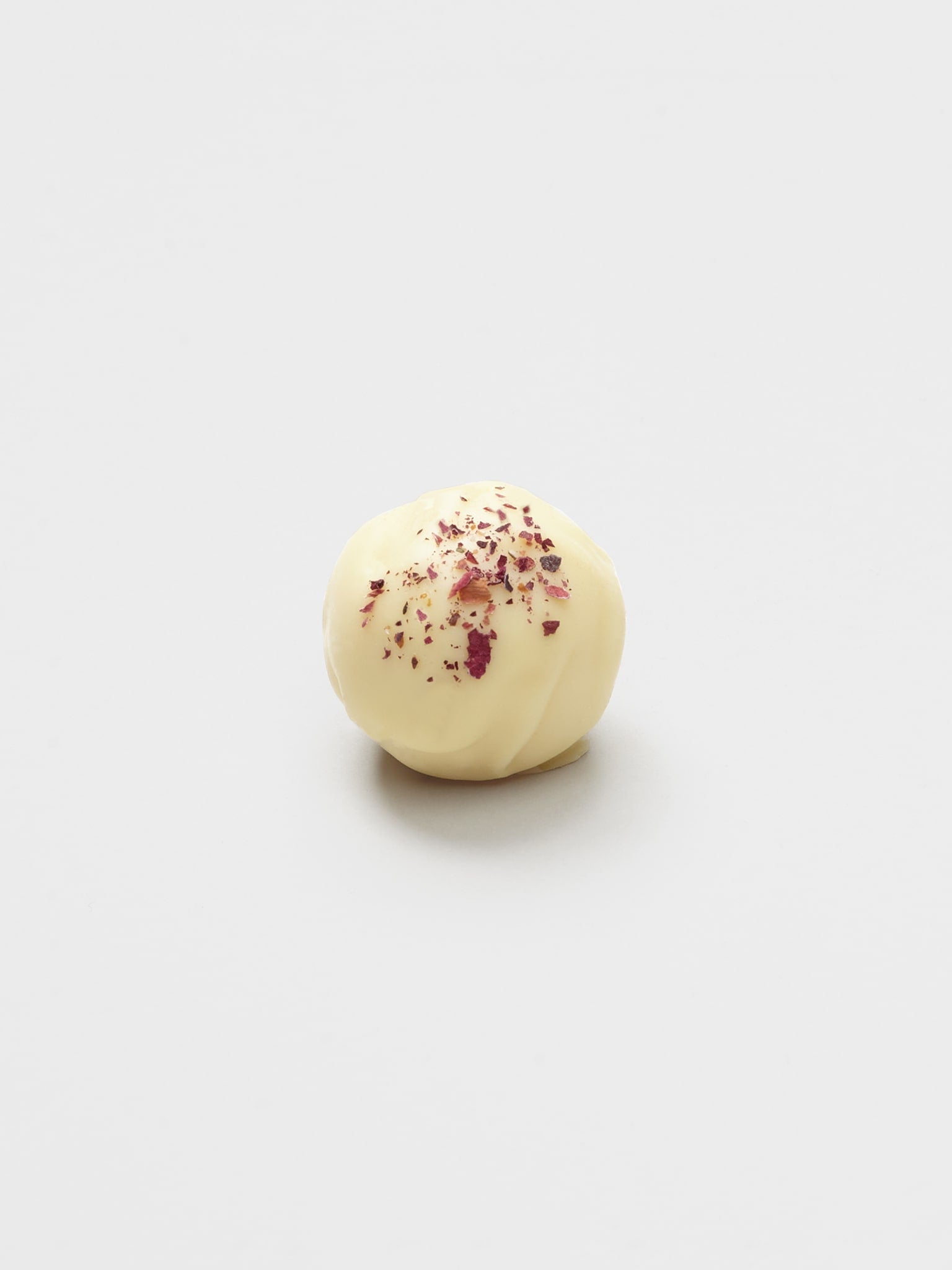 Rosen Praline mit weißer Schokolade